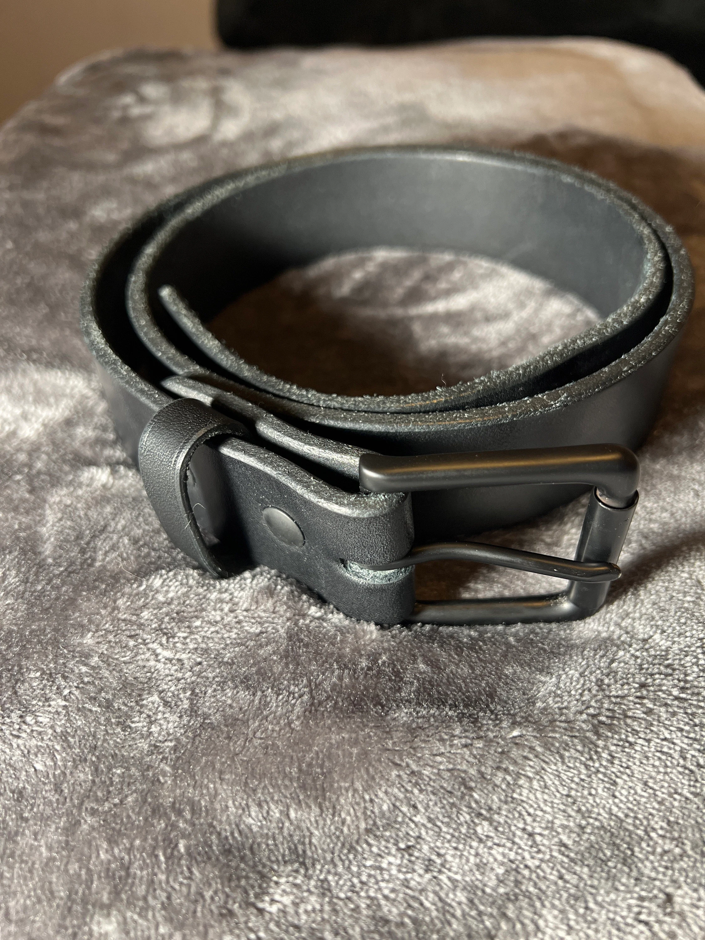 Customer photo submitted with Trend's Etsy review showing a black-on-black Moonlight Leatherworks belt.